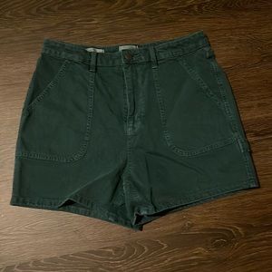 Green cargo shorts.